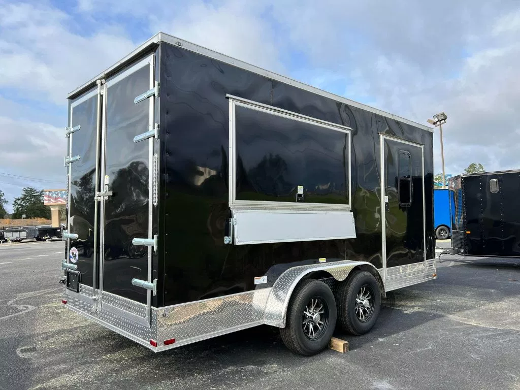 Quality Cargo food trailer featuring a concession window, fold-down serving shelf, three-basin sink package, air conditioning, and 50 AMP electrical service. 7X16 TA FOOD TRAILER - CONCESSION / VENDING - Quality Cargo - Image 1
